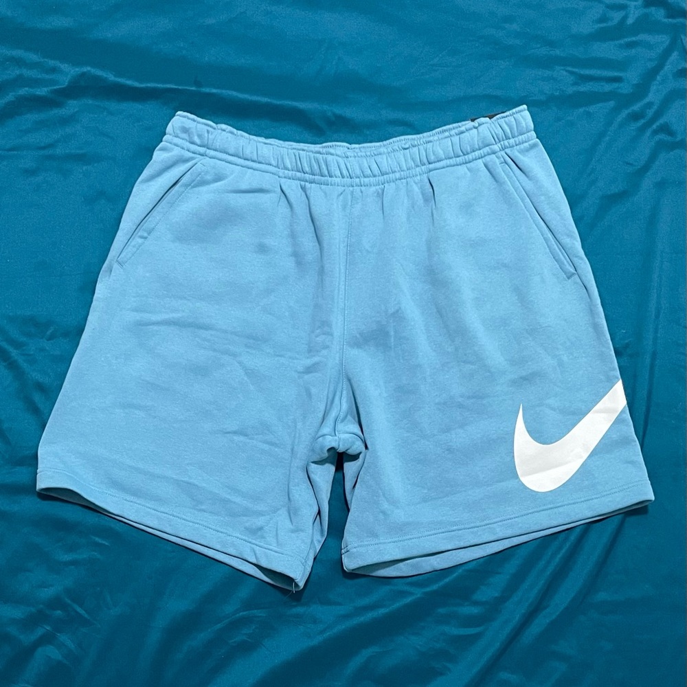 blue nike standard fit fleece shorts